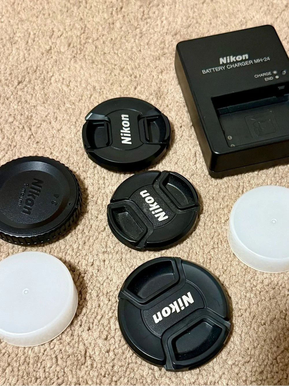 Nikon Camera Kit with Black Lenses and Red Strap